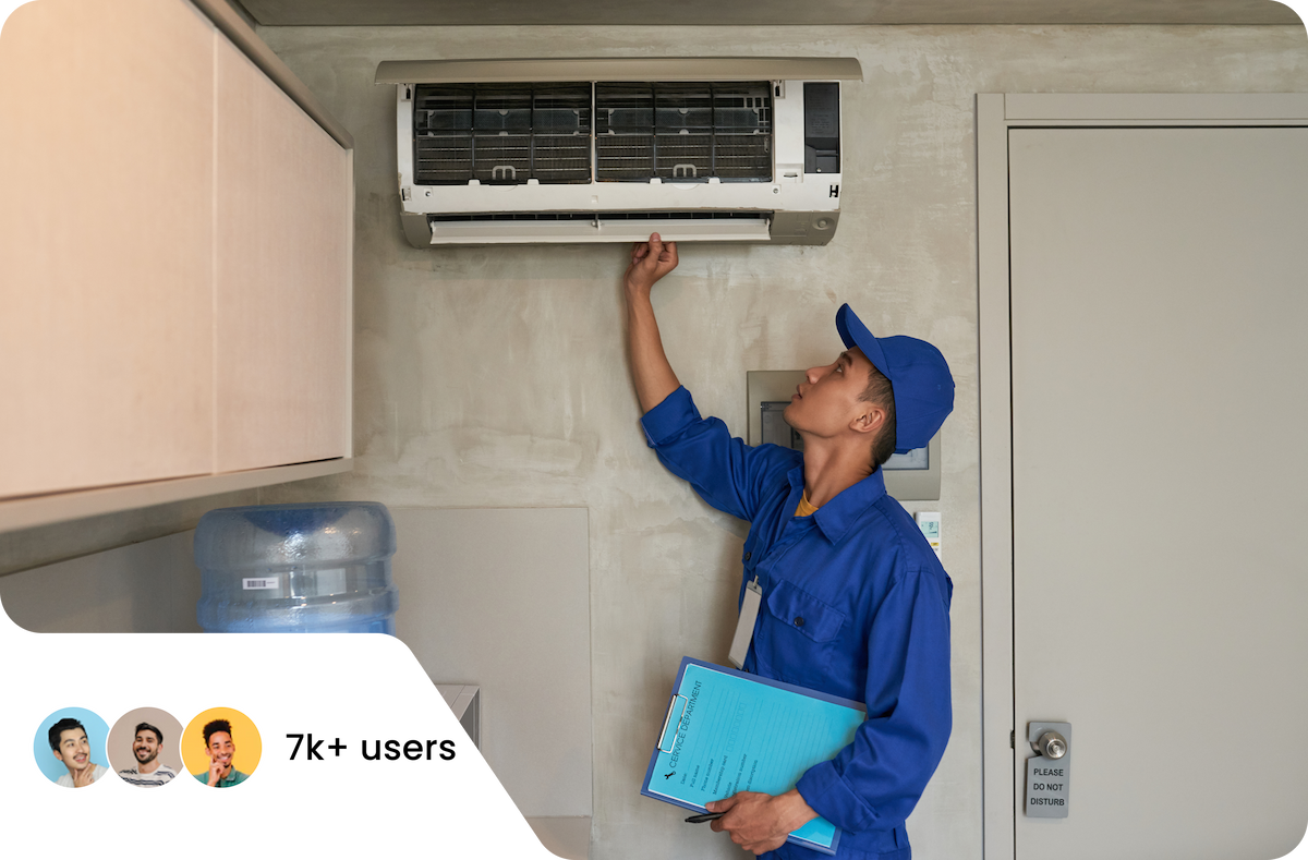 AC technician servicing unit